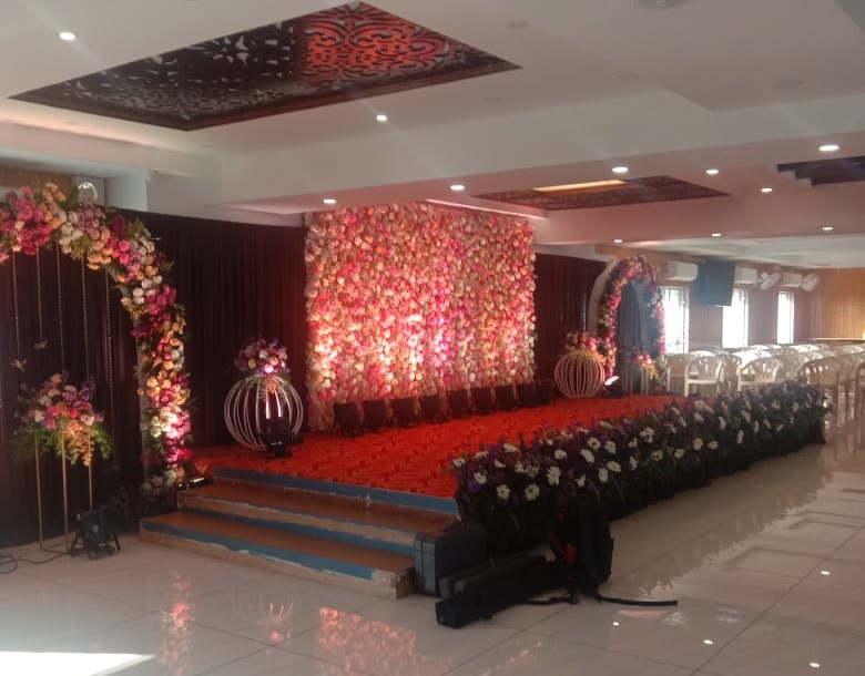 Traditional Mugurtham stage setup inside Kalyana Mandapam in Kolathur with rich interior decor